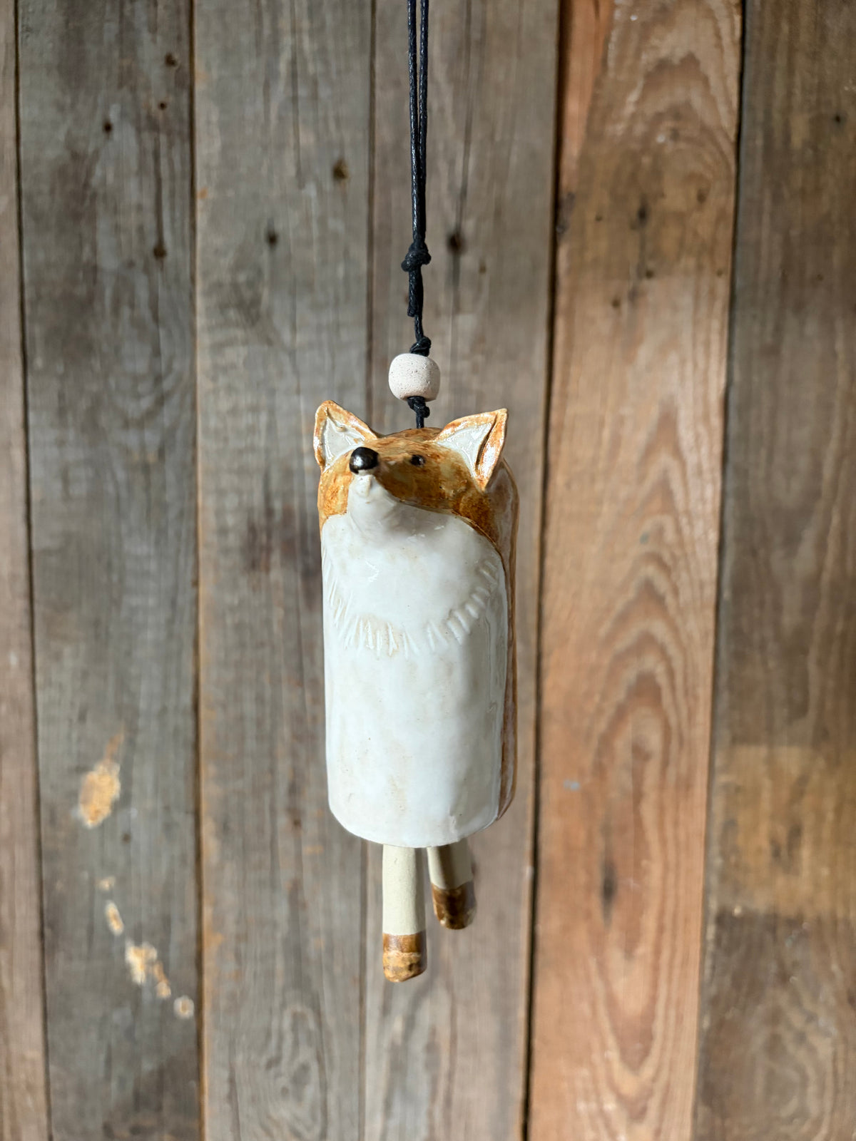 Una tintinnante campanella a forma di volpe del bosco