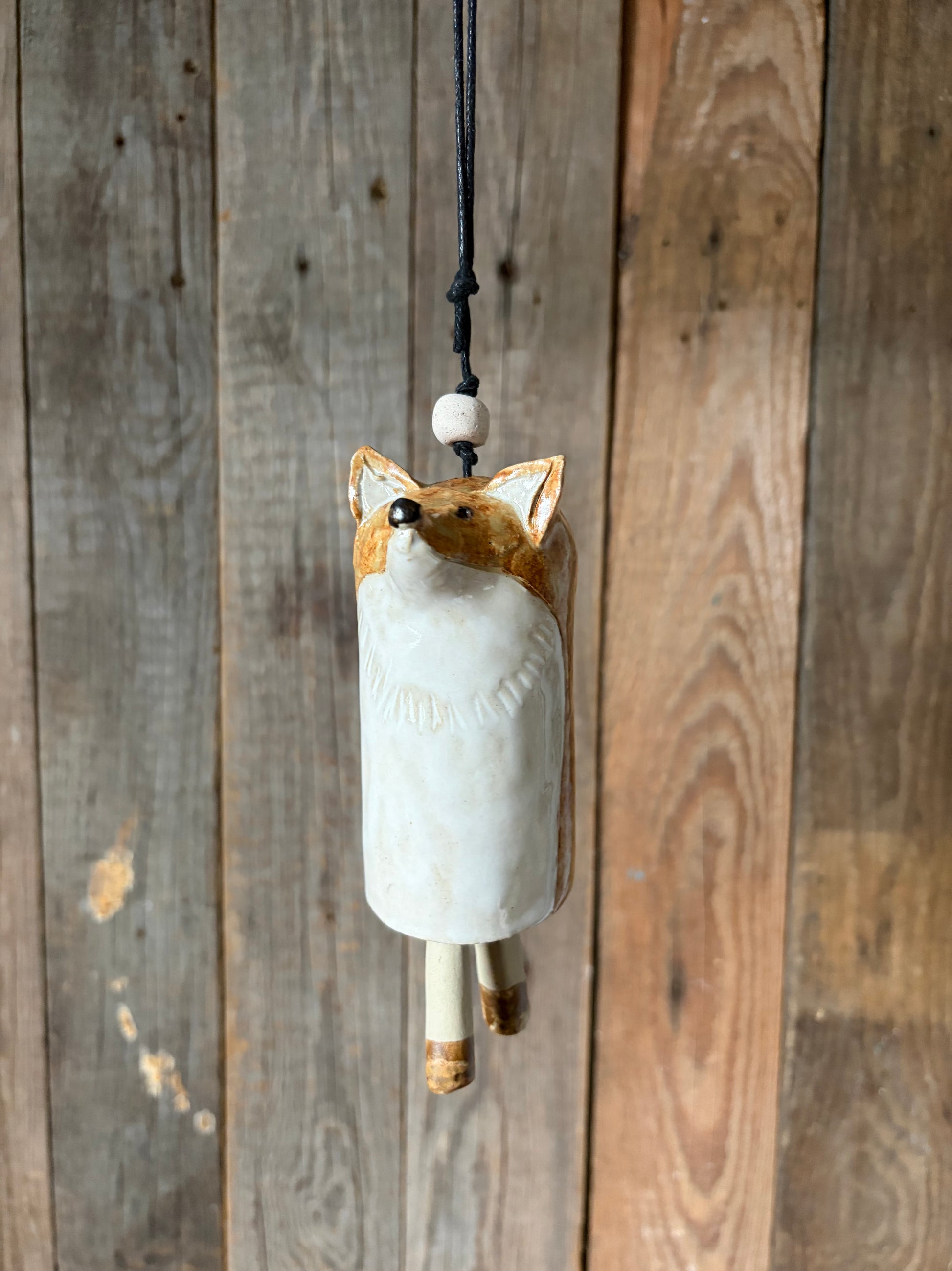 Una tintinnante campanella a forma di volpe del bosco